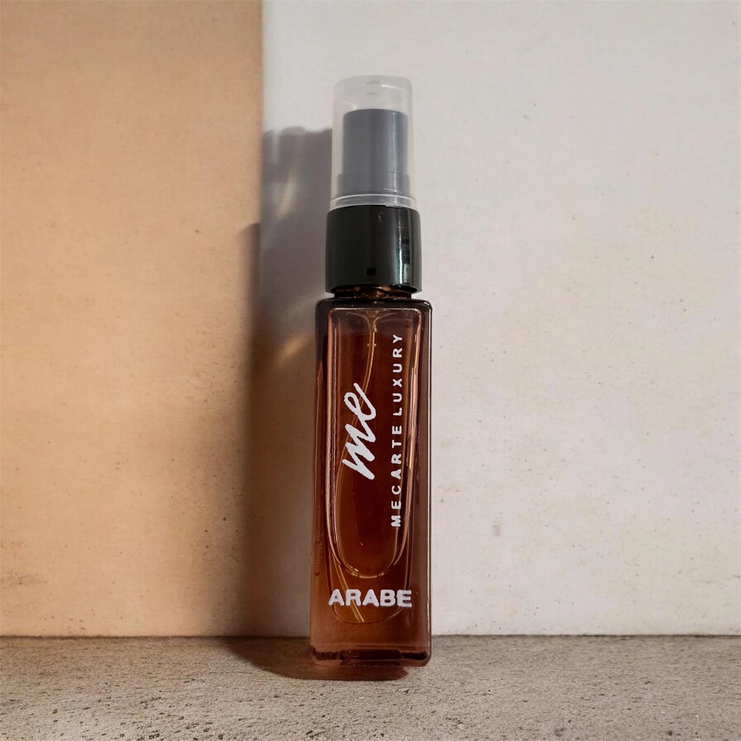 Miniature perfume collection featuring Arabe luxury fragrance in an 8ml spray bottle.