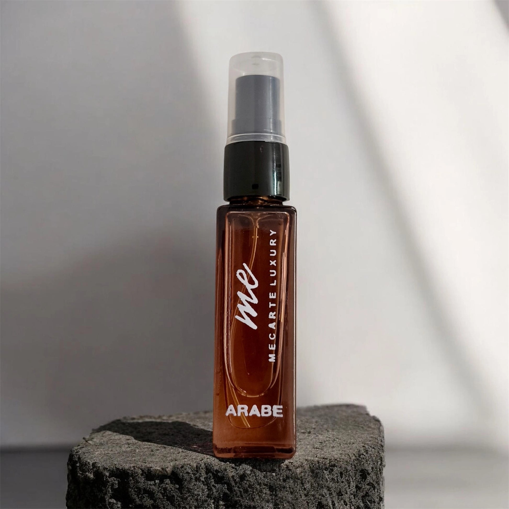 Miniature perfume collection in an 8ml spray bottle featuring Arabe and luxury branding.