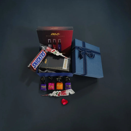 Luxury perfume gift set for him with chocolates and keepsake in elegant blue box.